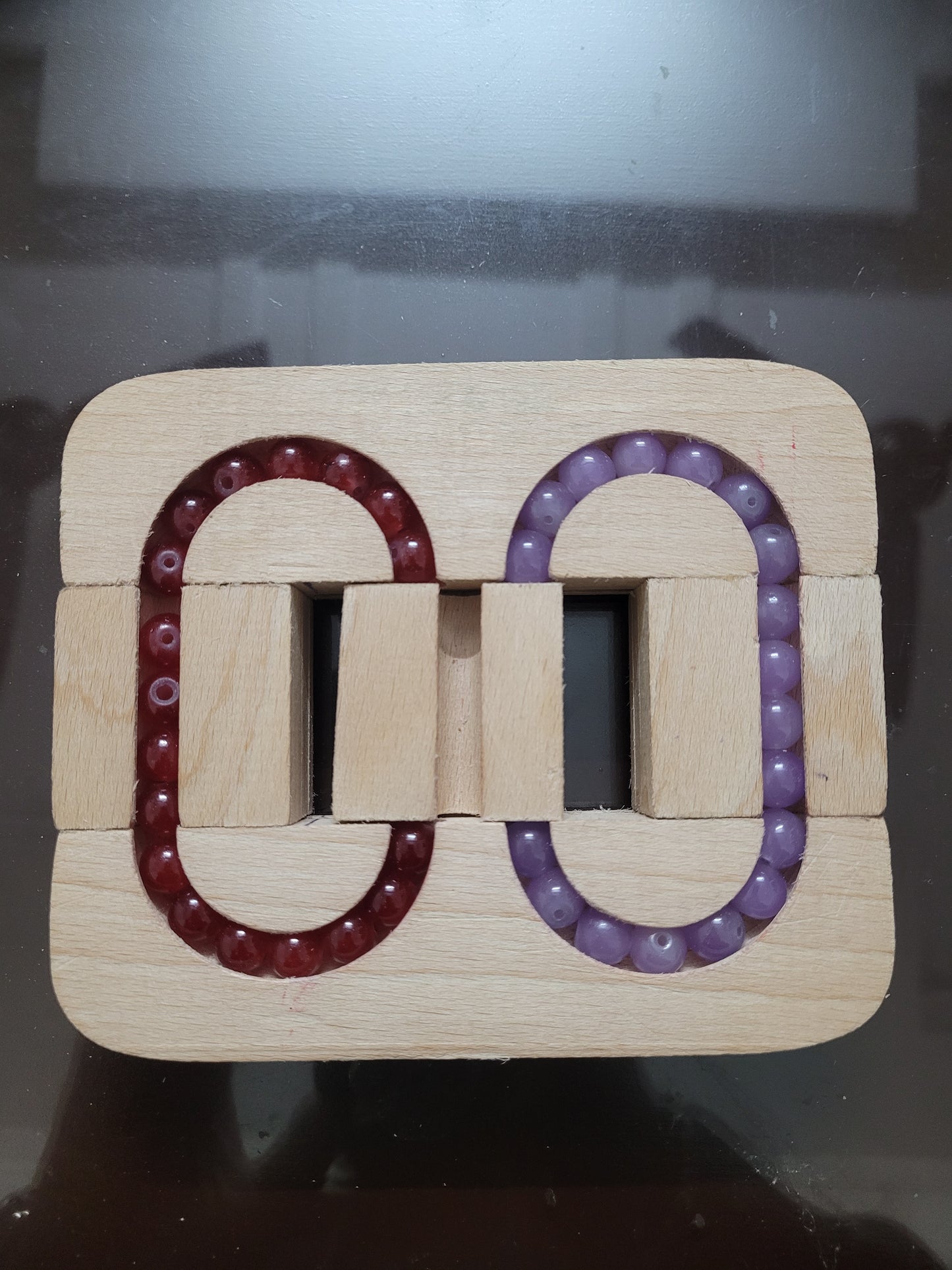 Two-Color Bead Sequencing Puzzle